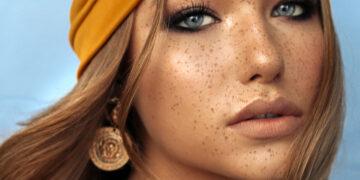 portrait of beautiful young woman with brown hair and freckles f